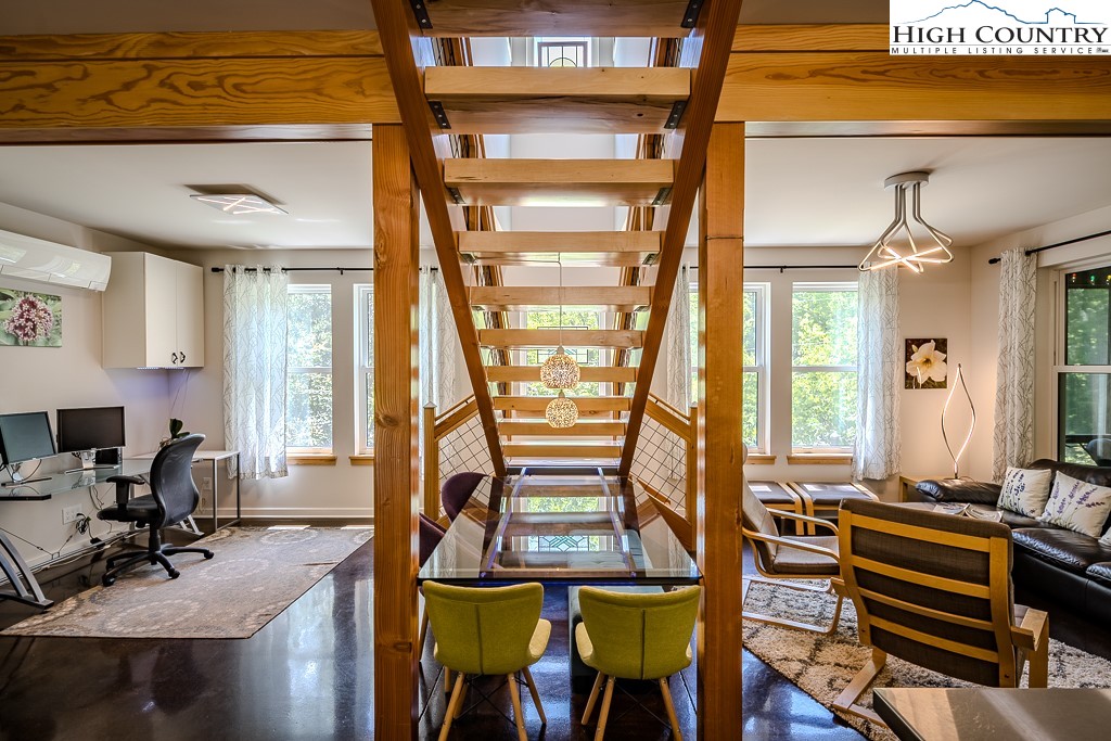 314 Hillandale Drive Boone, NC 28607 - Photo 9 of 49 a view of a hall with dining area and chandelier