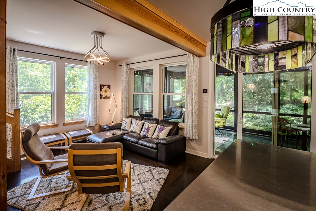 314 Hillandale Drive Boone, NC 28607 - Photo 10 of 49 a living room with furniture a ceiling fan and a window