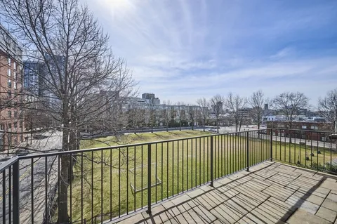 a view of a balcony with lake