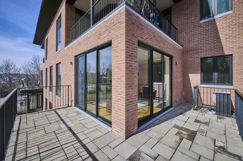 a view of a house with many windows