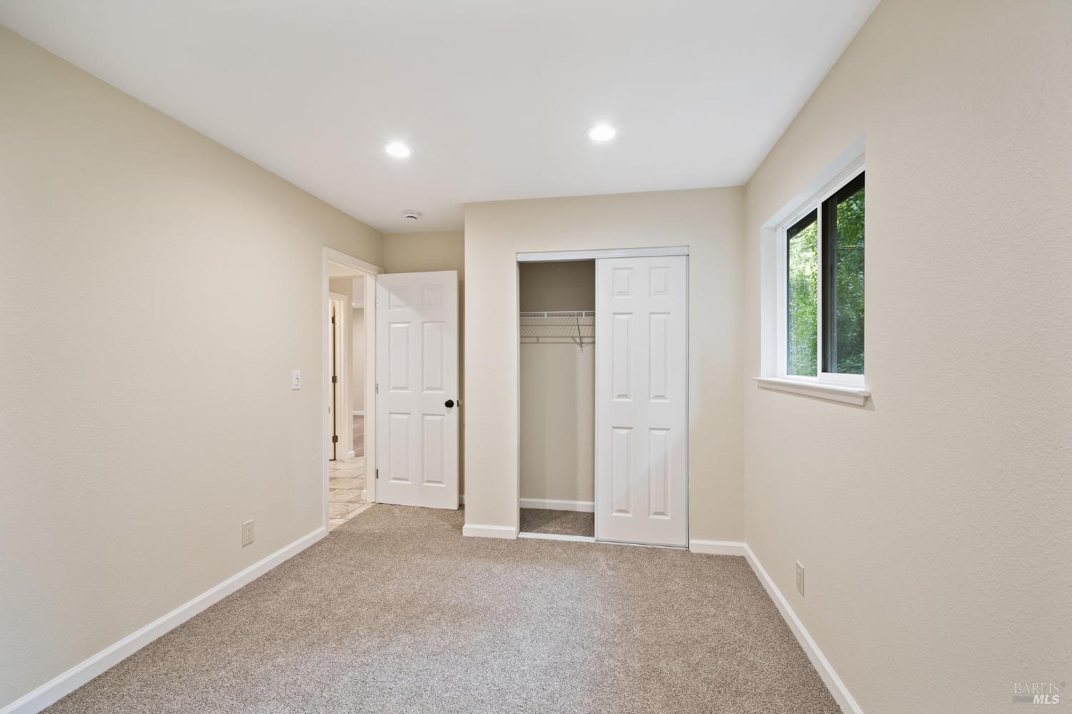 84 Front Street Camp Meeker, CA 95419 - Photo 14 of 24 an empty room with windows and closet