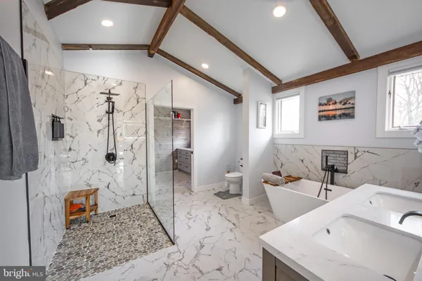 a view of a house with a yard and garage