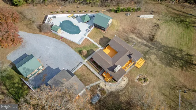 an aerial view of residential house with outdoor space