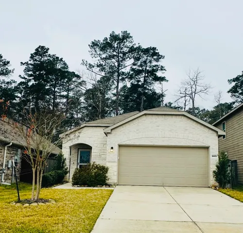 a view of a house with a garage