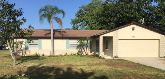 3685 Longbow Road Cocoa, FL 32926 - Photo 1 of 17 a view of a house with a yard