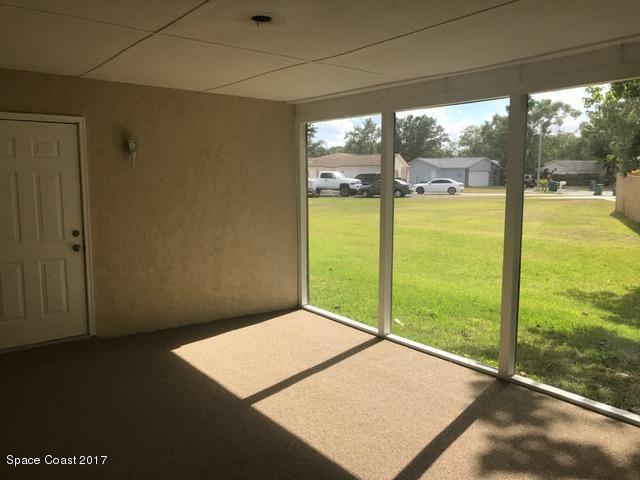 3685 Longbow Road Cocoa, FL 32926 - Photo 12 of 17 a view of an empty room and window