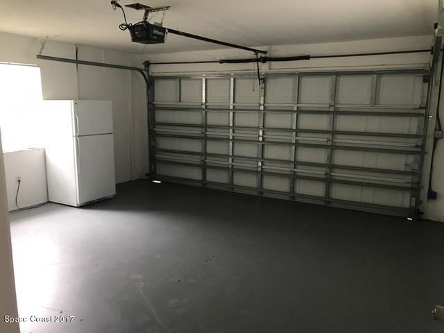3685 Longbow Road Cocoa, FL 32926 - Photo 16 of 17 a view of a garage