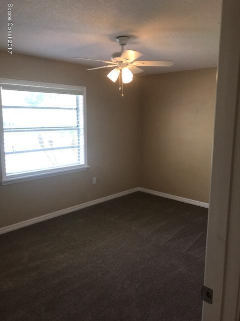 3685 Longbow Road Cocoa, FL 32926 - Photo 9 of 17 a view of empty room with window