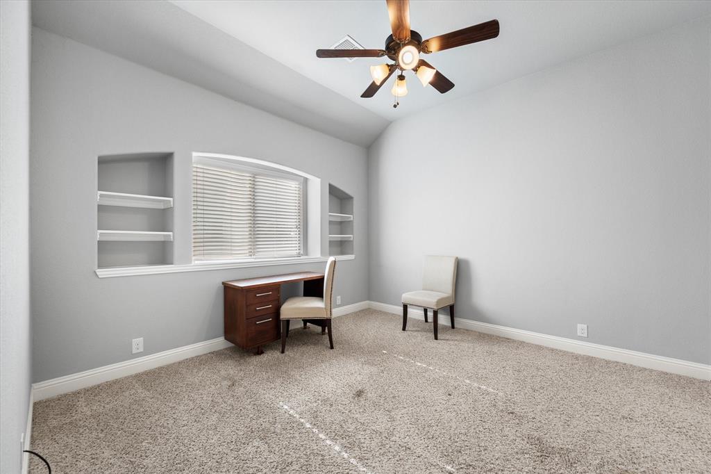 7235 Neblina Drive Grand Prairie, TX 75054 - Photo 20 of 32 a living room with furniture and a window
