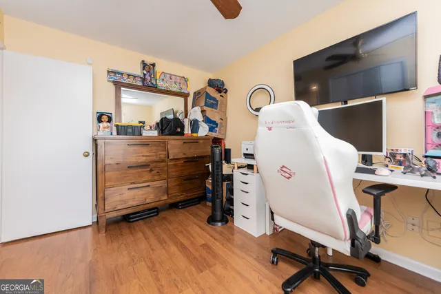a room with chair and gym equipment