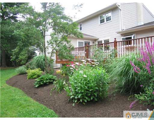 11 Devon Road Edison, NJ 08820 - Photo 13 of 23 a front view of a house with garden