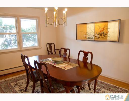 11 Devon Road Edison, NJ 08820 - Photo 3 of 23 a view of a dining room with furniture and window
