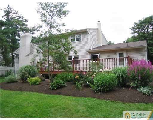 11 Devon Road Edison, NJ 08820 - Photo 23 of 23 a front view of a house with garden
