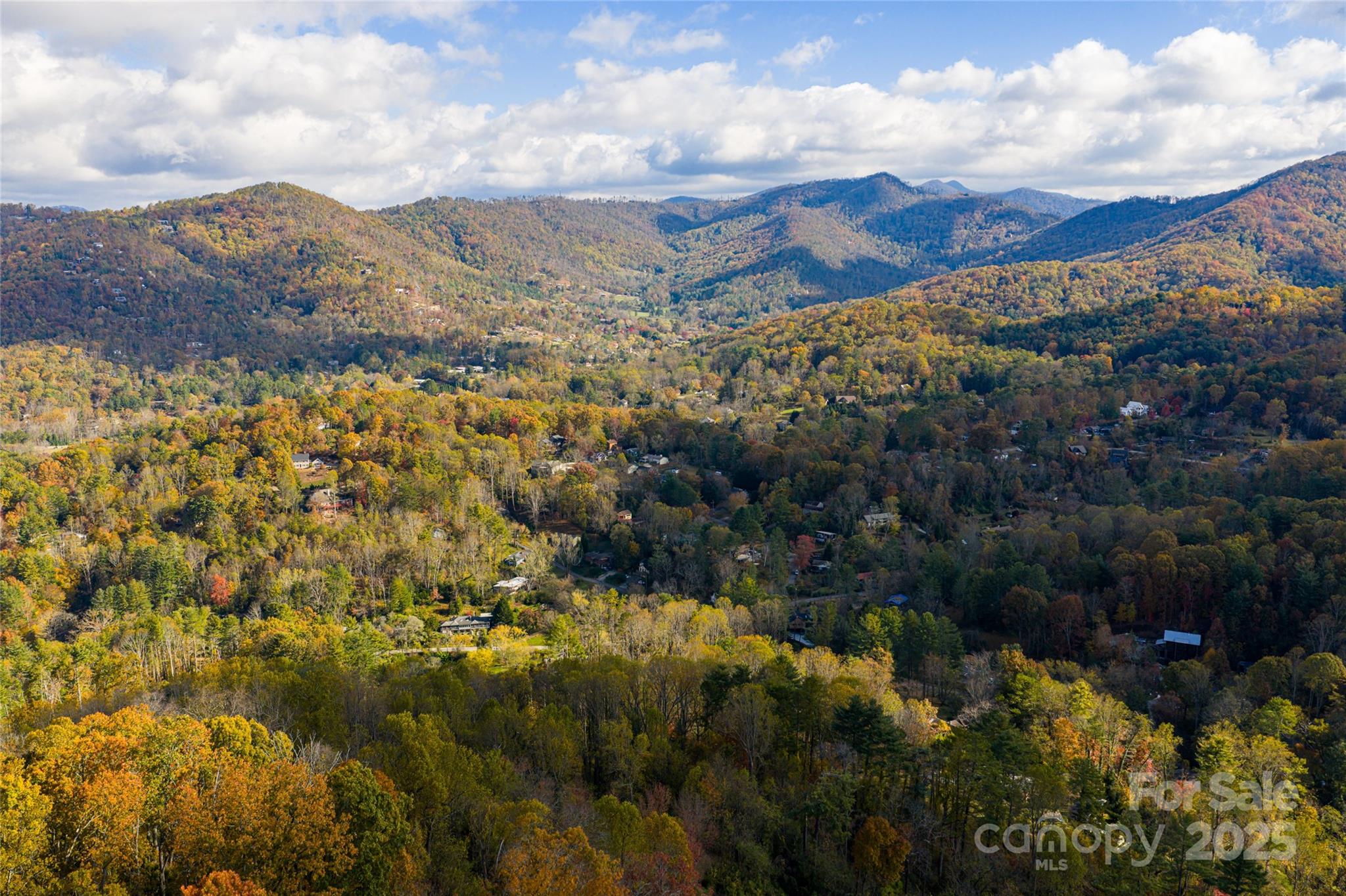 33 Grovepoint Way Asheville, NC 28804 - Photo 11 of 32 a view of a building with mountains in the background
