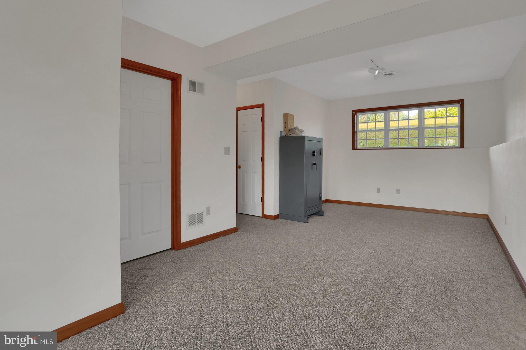 6124 Gregory Road Spring Grove, PA 17362 - Photo 22 of 43 a view of an empty room with a window