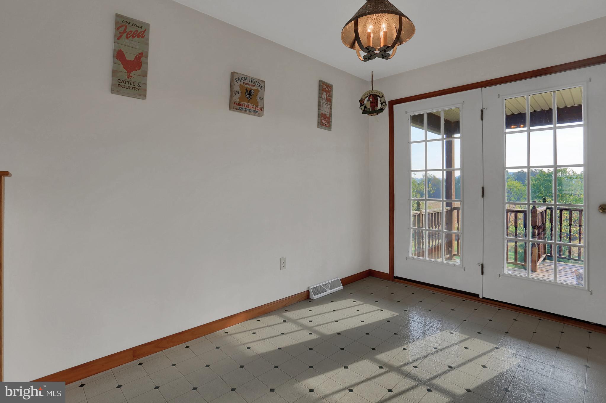 6124 Gregory Road Spring Grove, PA 17362 - Photo 8 of 43 a view of an empty room with a window