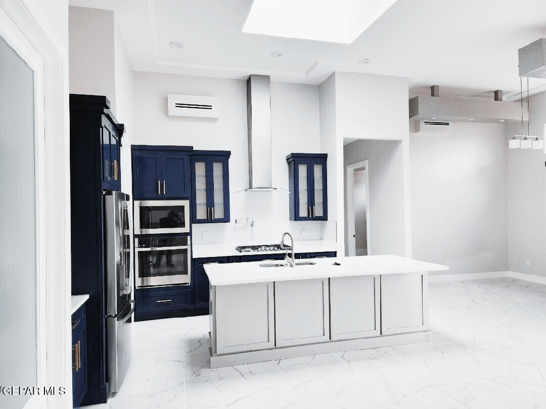 3232 Cascade Point El Paso, TX 79938 - Photo 2 of 17 a kitchen with stainless steel appliances a sink and a refrigerator