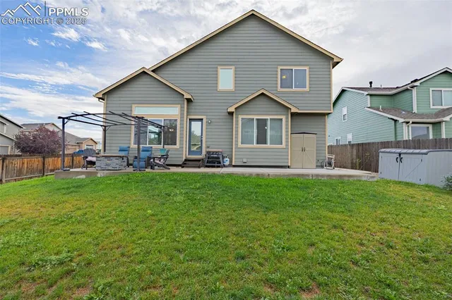 a front view of a house with a yard and porch
