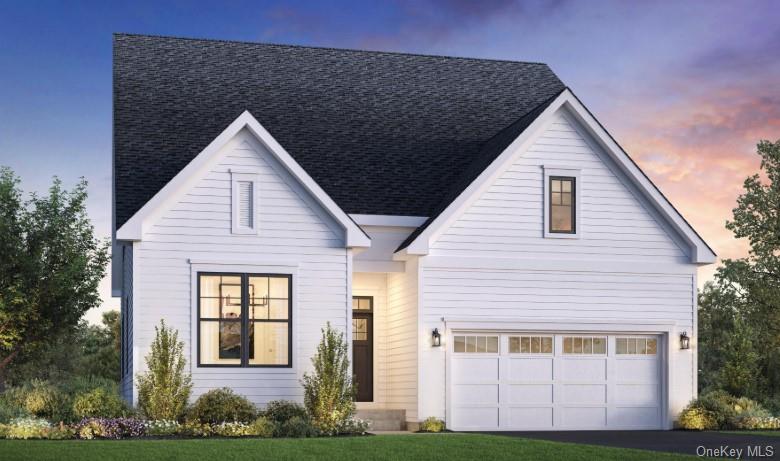 a view of a house with yard and plants