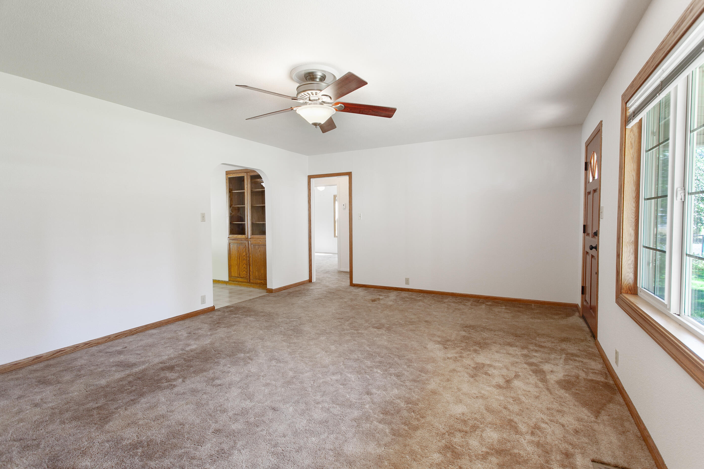 37362 Birch Avenue Burney, CA 96013 - Photo 7 of 27 an empty room with windows and fan
