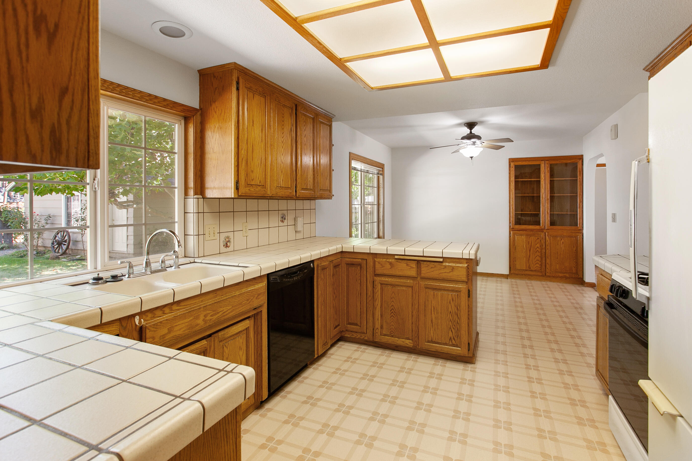 37362 Birch Avenue Burney, CA 96013 - Photo 8 of 27 a large kitchen with a sink and cabinets