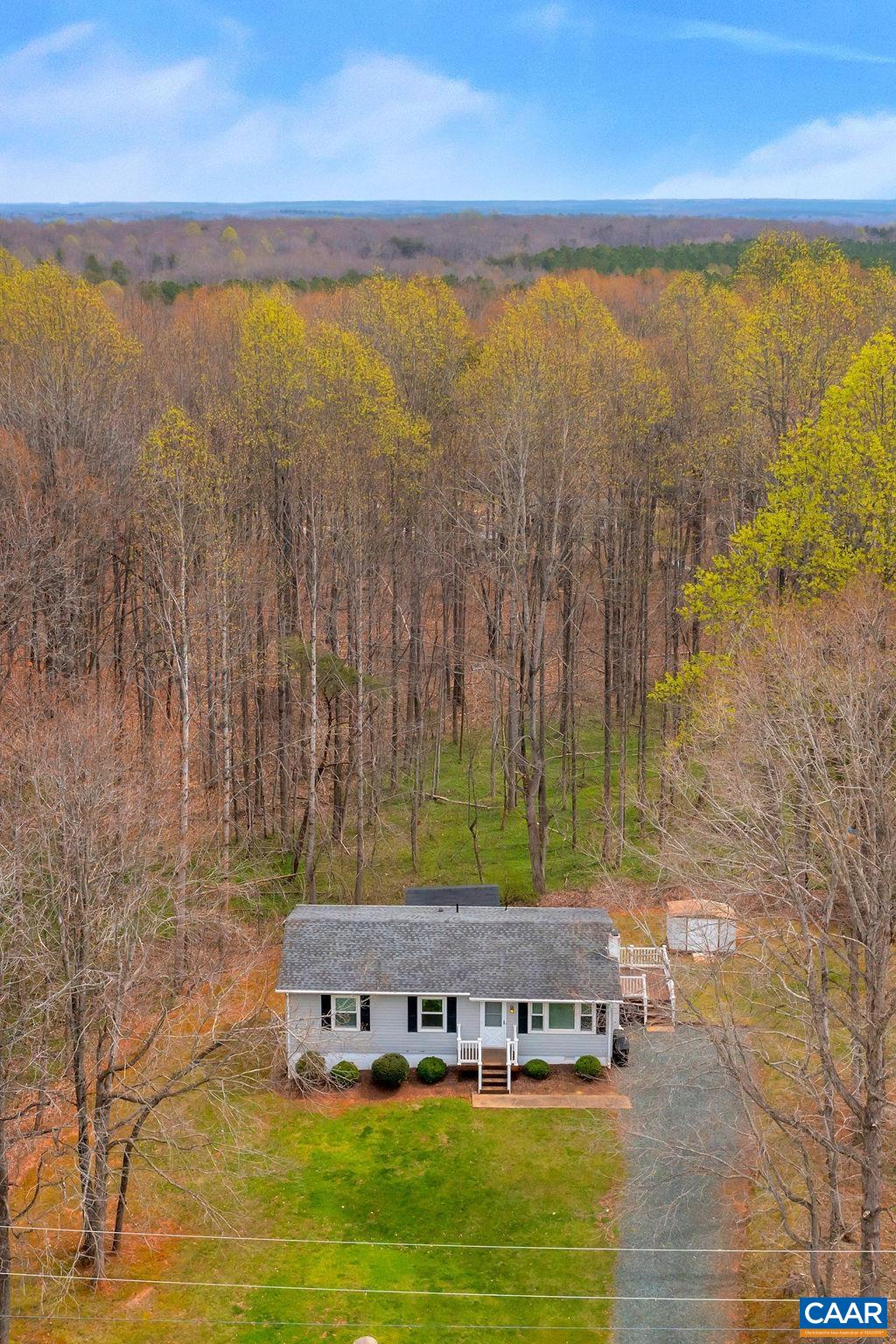 232 Rising Sun Road Palmyra, VA 22963 - Photo 3 of 31 a view of a swimming pool with an ocean view