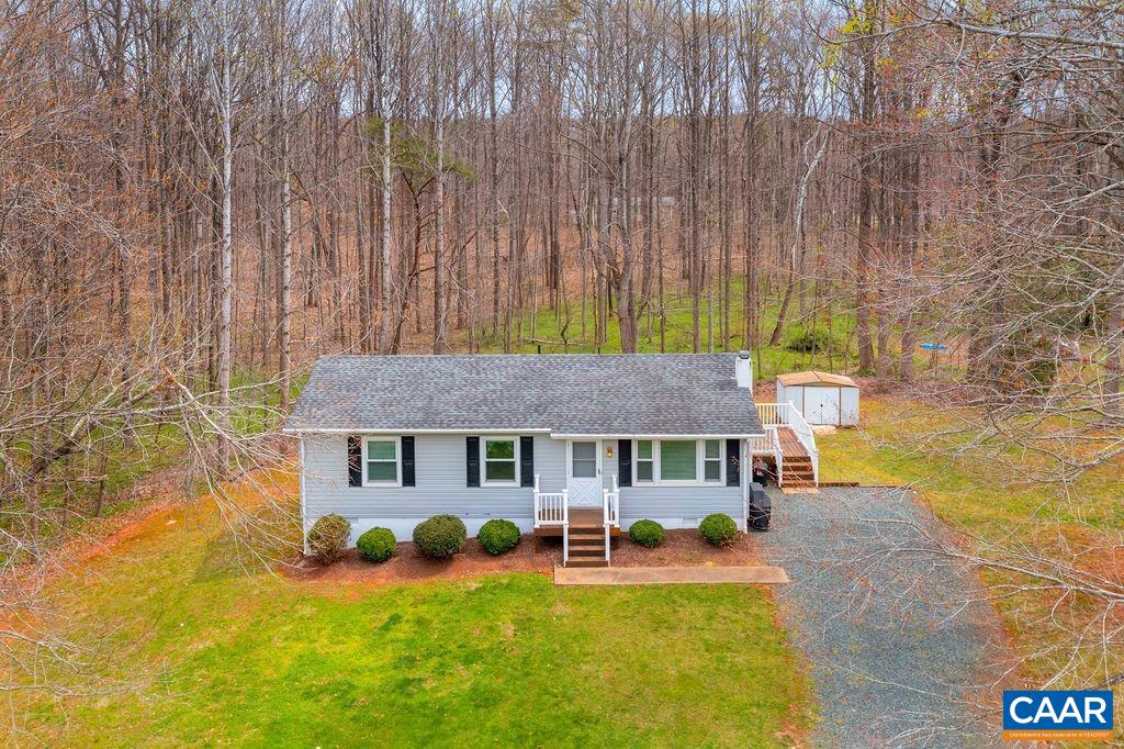 232 Rising Sun Road Palmyra, VA 22963 - Photo 4 of 31 a view of a house with swimming pool and sitting area