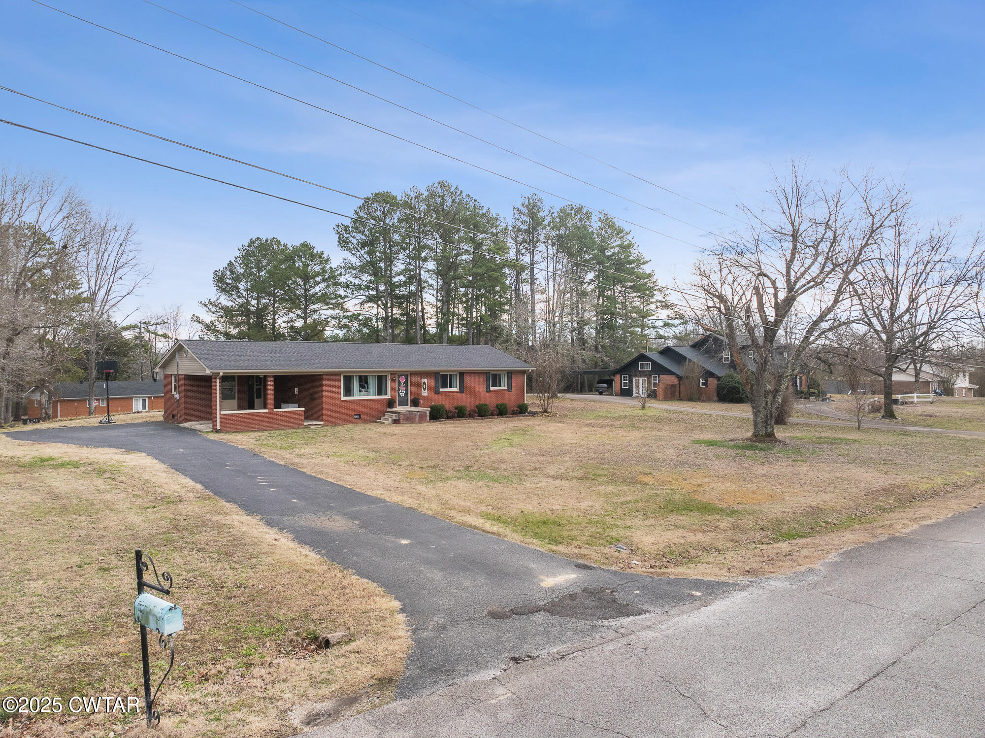 725 East Poplar Drive Decaturville, TN 38329 - Photo 27 of 43 a view of a house with snow on the road