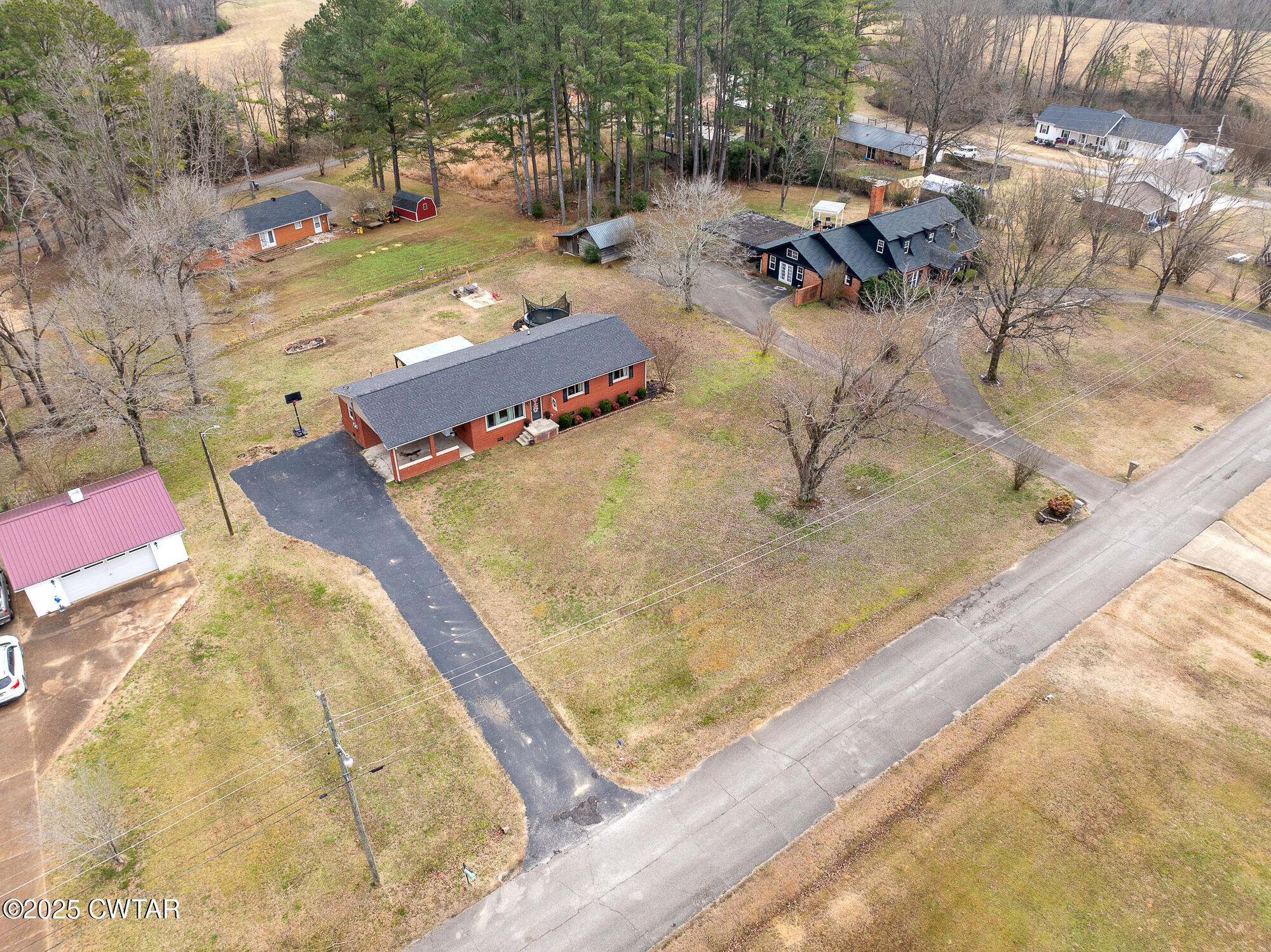 725 East Poplar Drive Decaturville, TN 38329 - Photo 28 of 43 swimming pool view with a sitting space