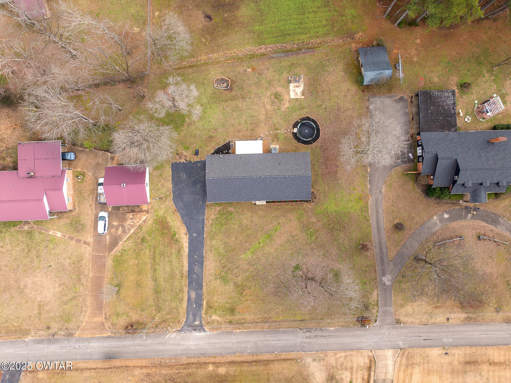725 East Poplar Drive Decaturville, TN 38329 - Photo 29 of 43 an aerial view of residential houses with outdoor space