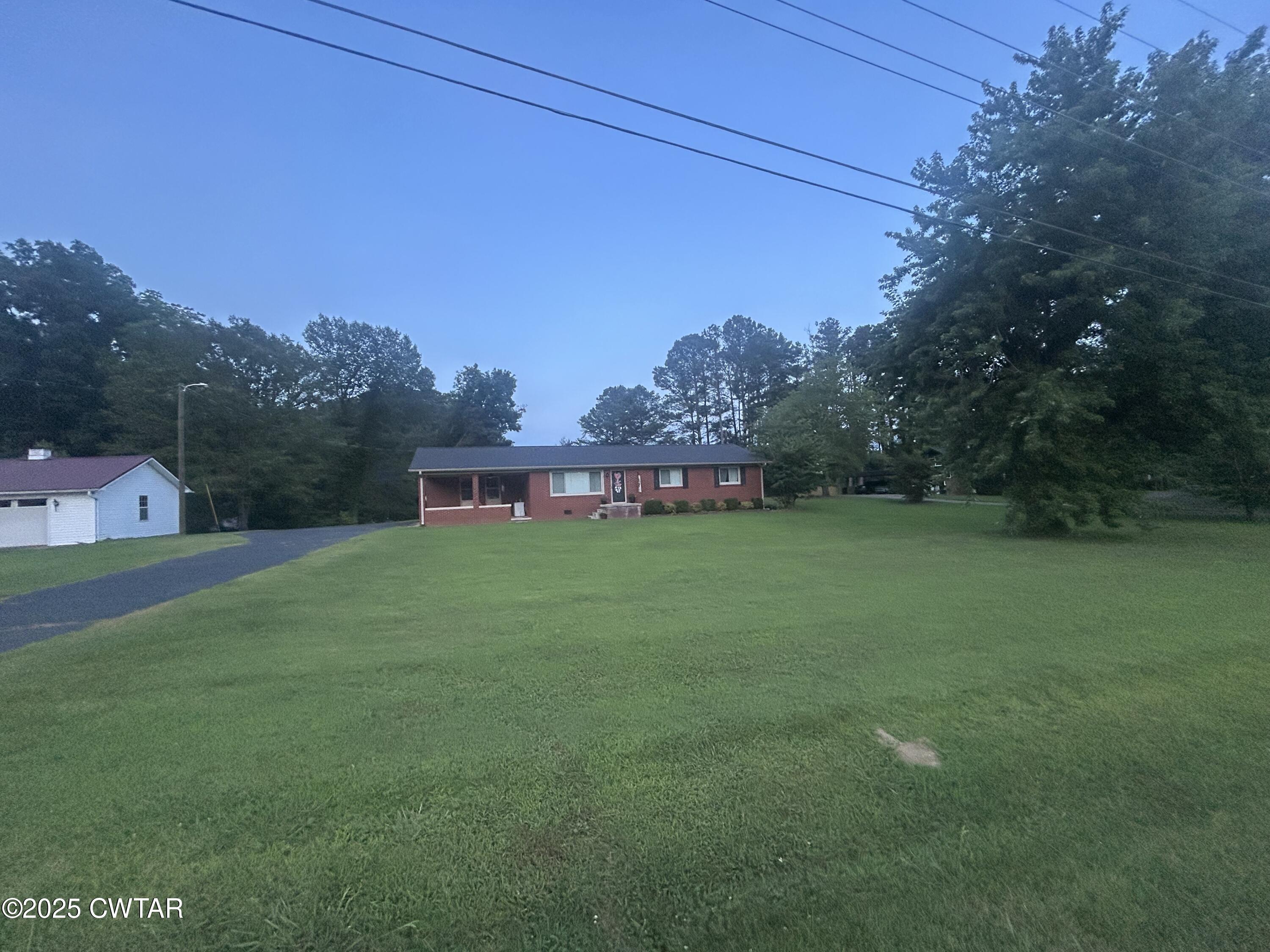 725 East Poplar Drive Decaturville, TN 38329 - Photo 43 of 43 a view of a house with a big yard