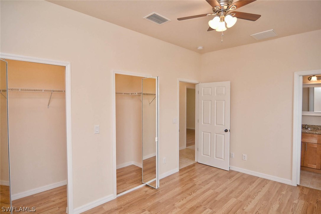 18632 Holly Road Fort Myers, FL 33967 - Photo 12 of 16 a view of a room with wooden floor
