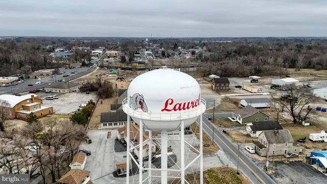 an aerial view of a house with swimming pool