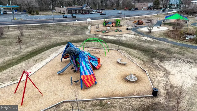 a view of multiple houses with outdoor space