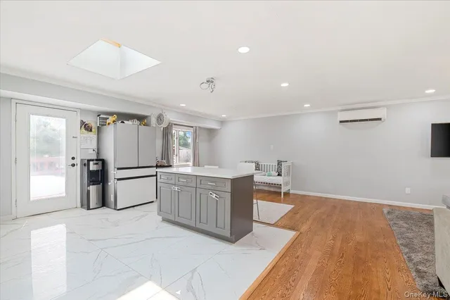 a kitchen with stainless steel appliances granite countertop a sink and cabinets