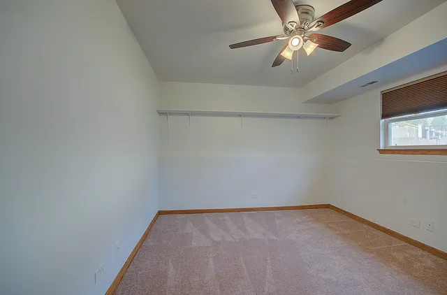 an empty room with a bathroom