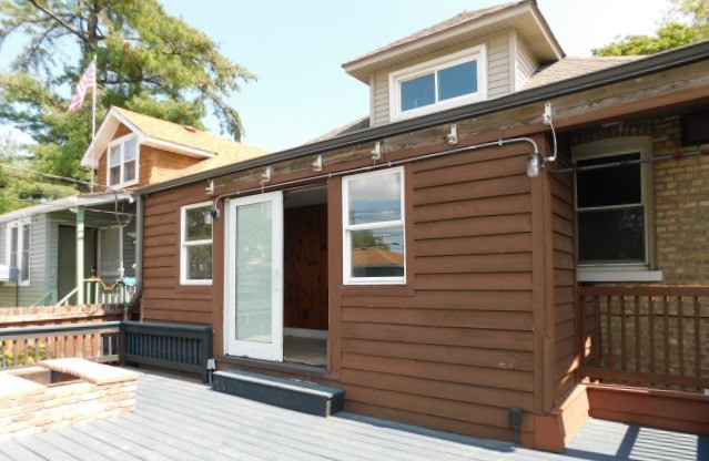 Undisclosed Address Chicago, IL 60630 - Photo 15 of 16 a view of house with a outdoor space
