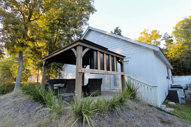 a house with trees in front of it