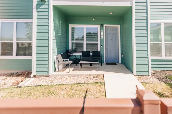a house view with a outdoor space