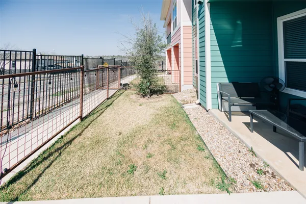 a view of balcony and yard