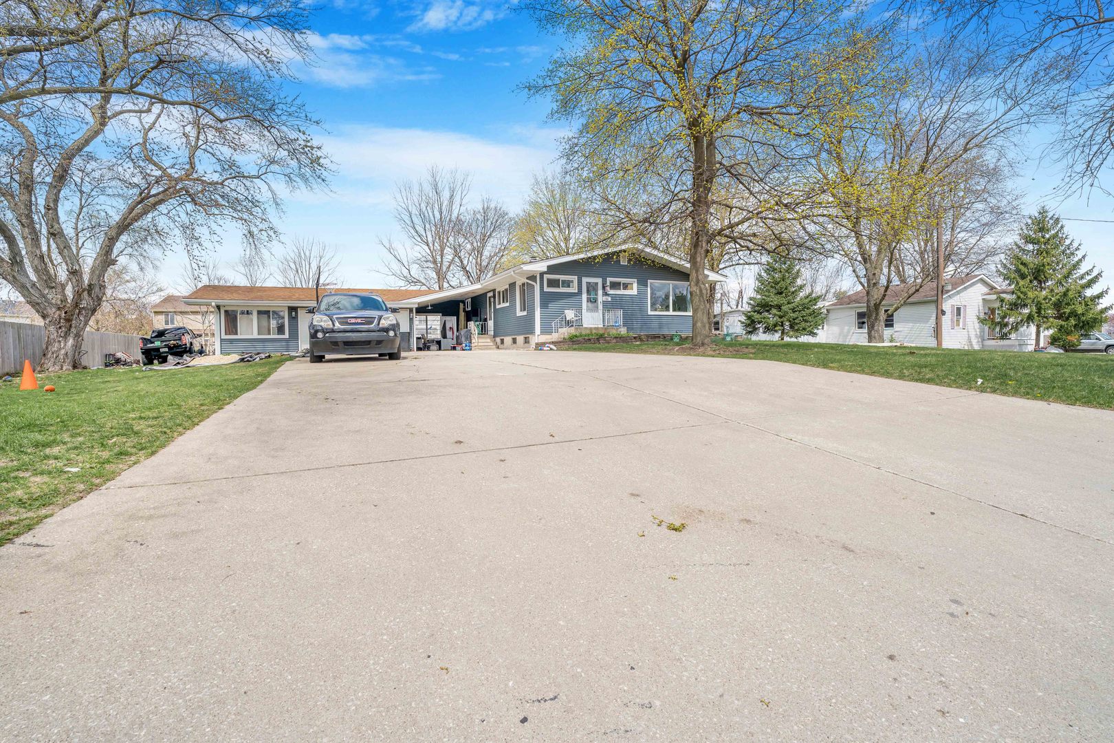 22252 West Taylor Road Plainfield, IL 60544 - Photo 14 of 29 front view of house with a yard and trees