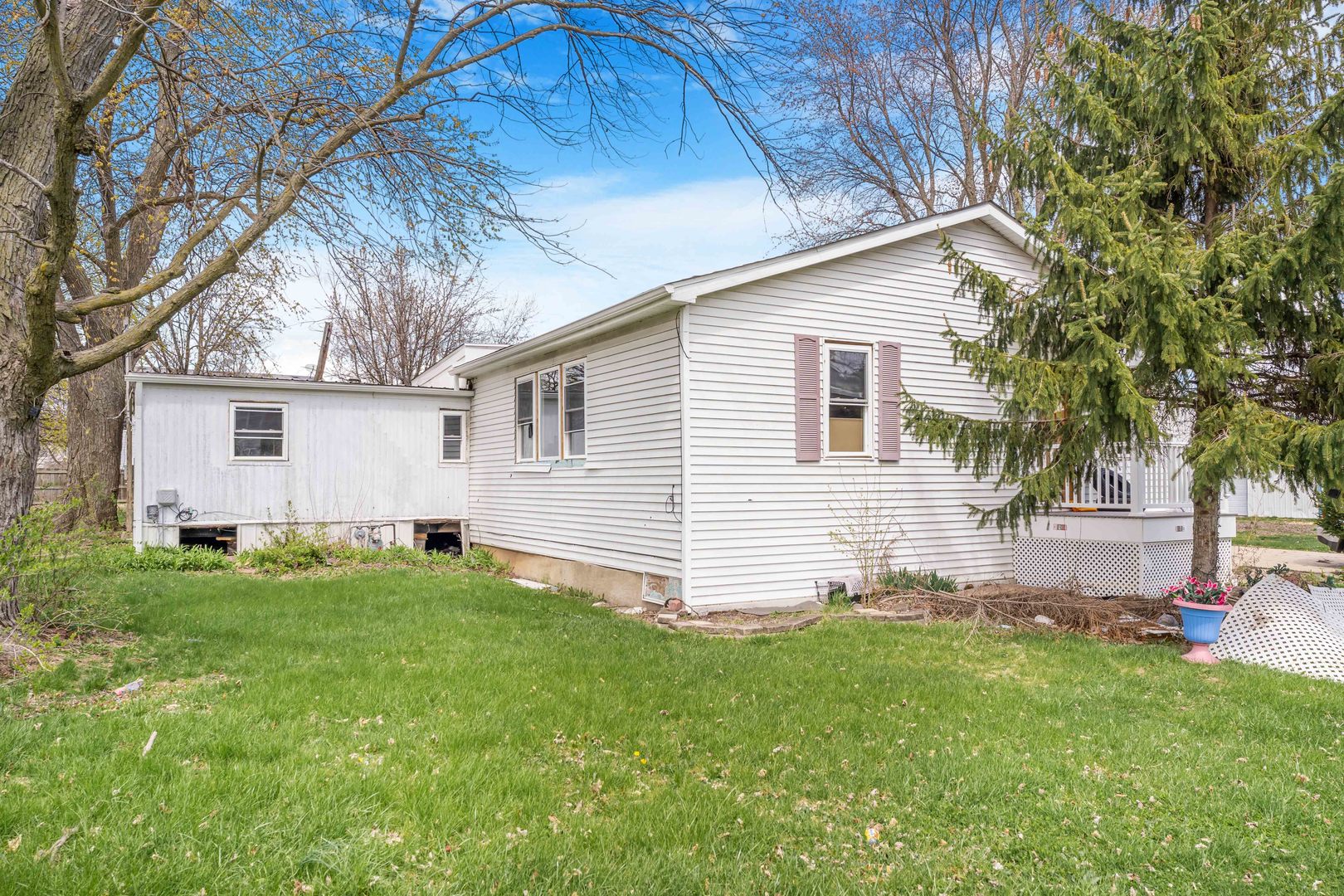 22252 West Taylor Road Plainfield, IL 60544 - Photo 18 of 29 a view of a backyard with plants and large tree