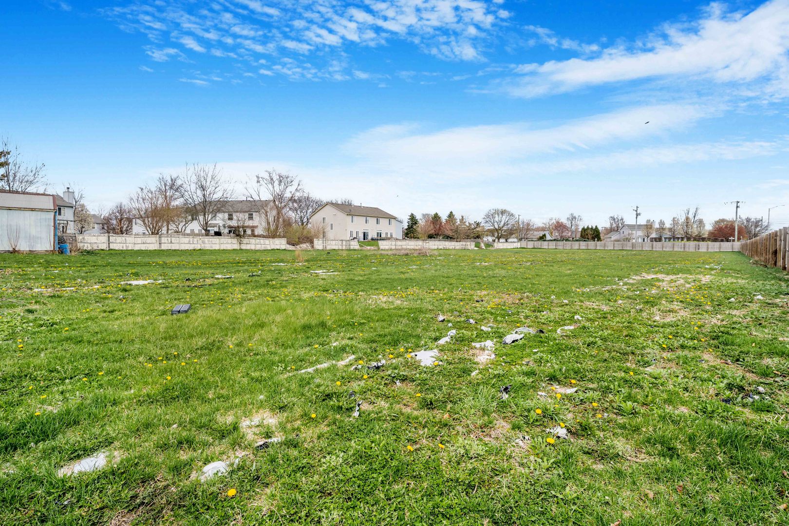22252 West Taylor Road Plainfield, IL 60544 - Photo 21 of 29 a view of a big yard with a house in the background