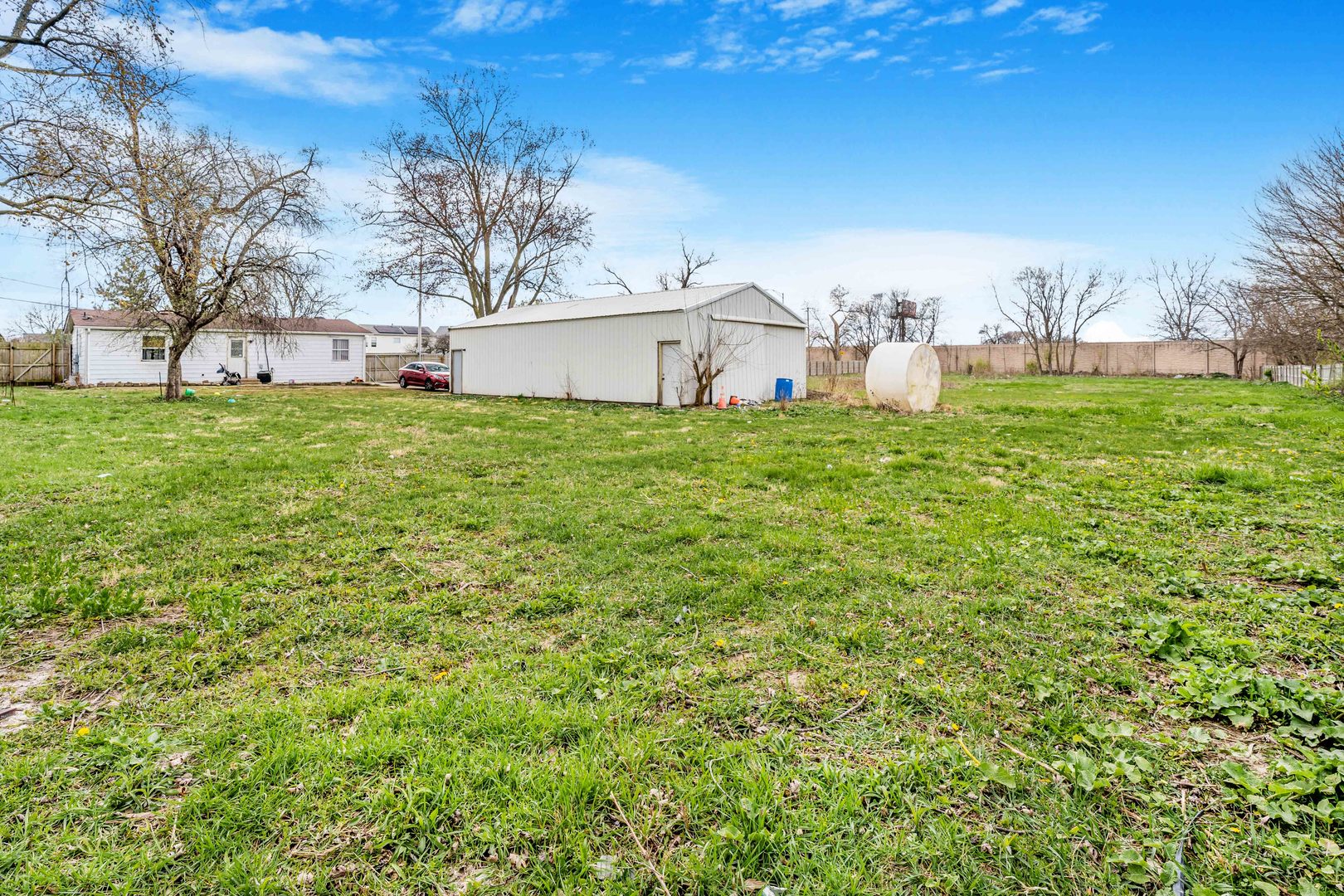 22252 West Taylor Road Plainfield, IL 60544 - Photo 25 of 29 a view of a house with a yard