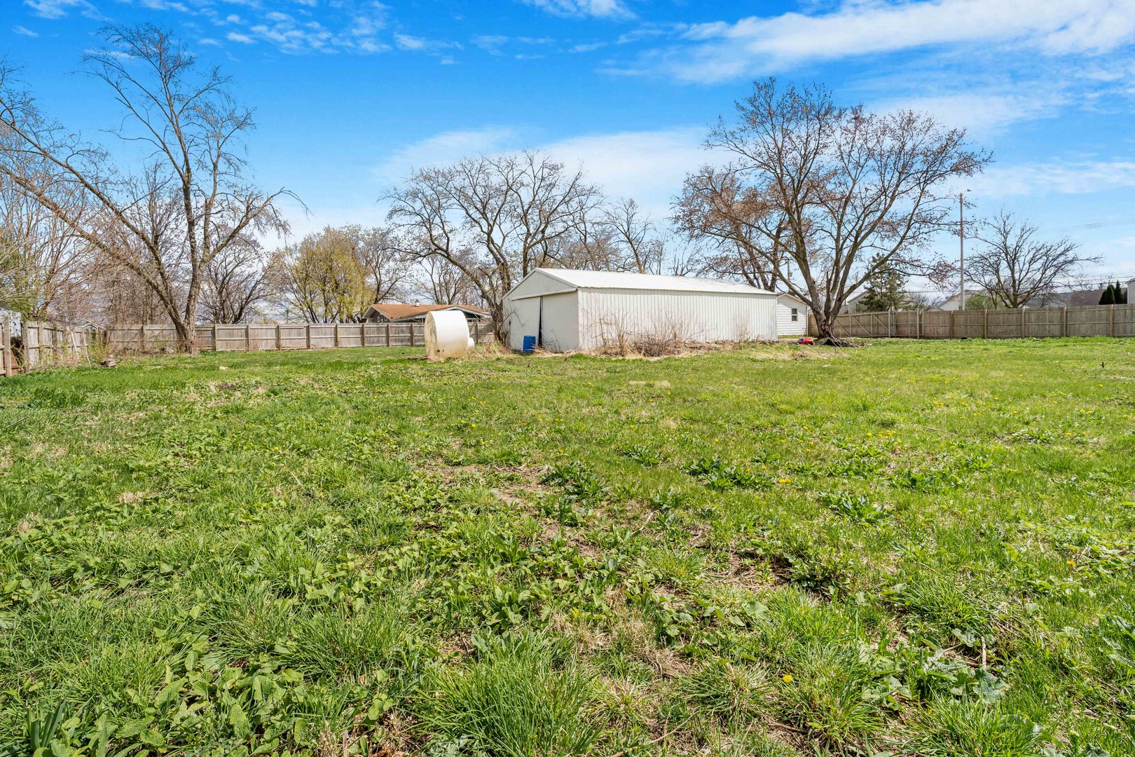 22252 West Taylor Road Plainfield, IL 60544 - Photo 26 of 29 a view of a backyard with large trees