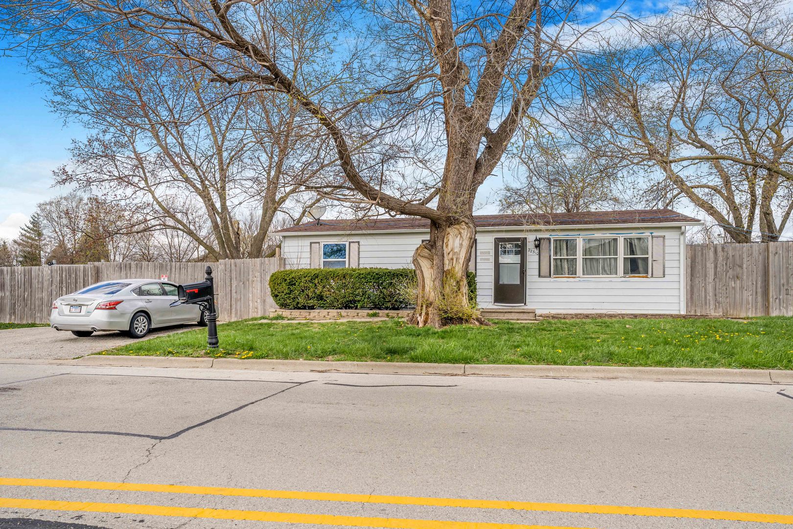 22252 West Taylor Road Plainfield, IL 60544 - Photo 28 of 29 a view of a house with a garden and pathway