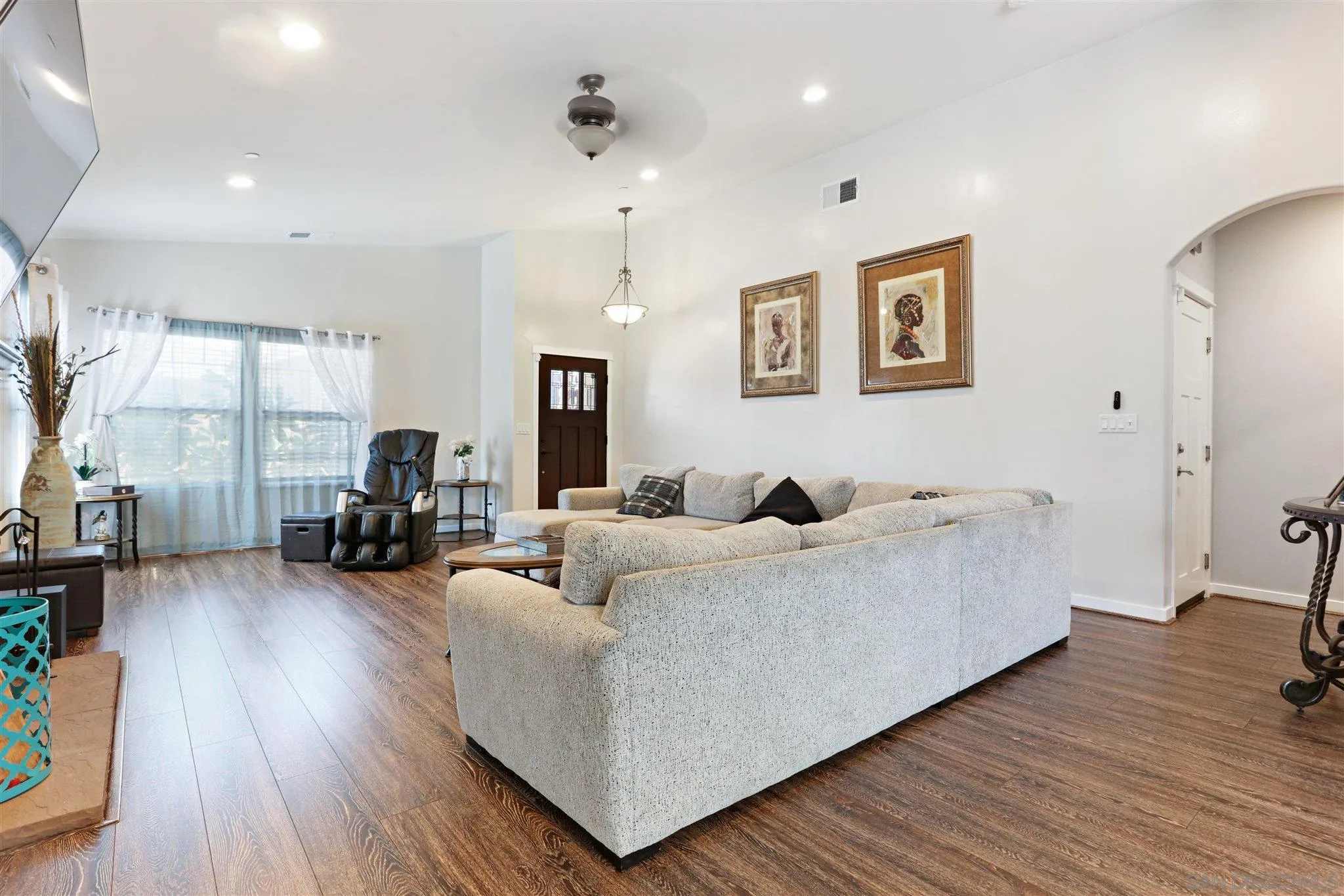 1243 Peach Avenue El Cajon, CA 92021 - Photo 10 of 27 a living room with furniture and a wooden floor