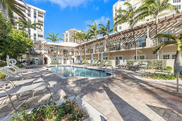 a view of a lake with a building in the background