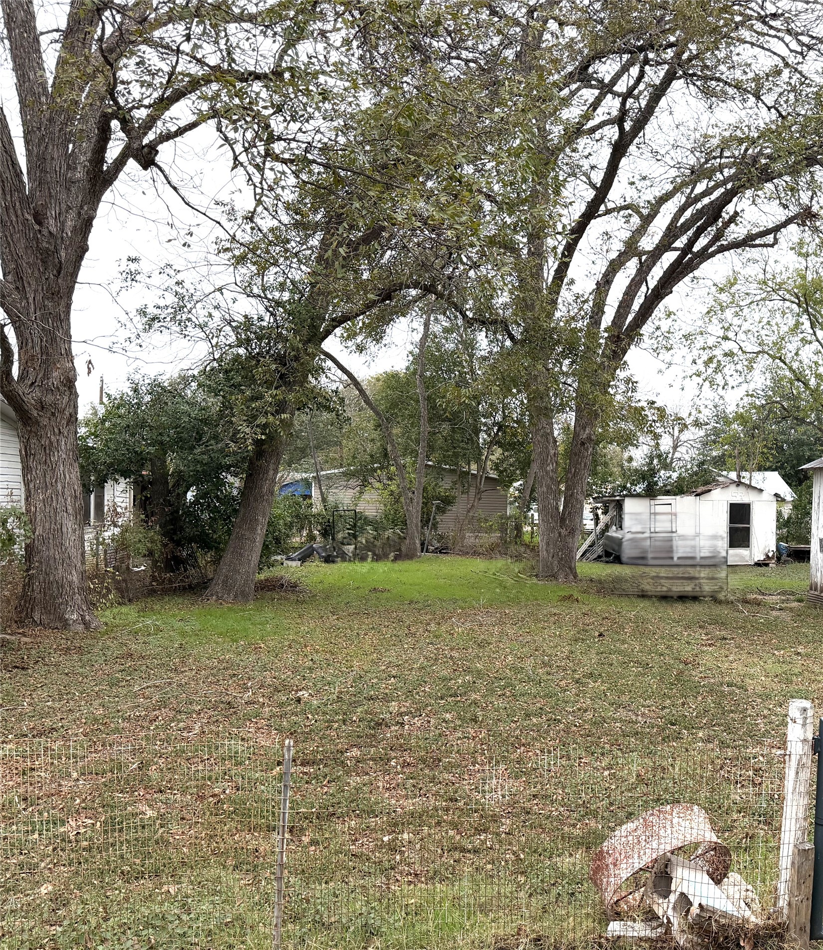 0 Persimmon Street Lockhart, TX 78644 - Photo 2 of 4 a backyard of a house with lots of green space