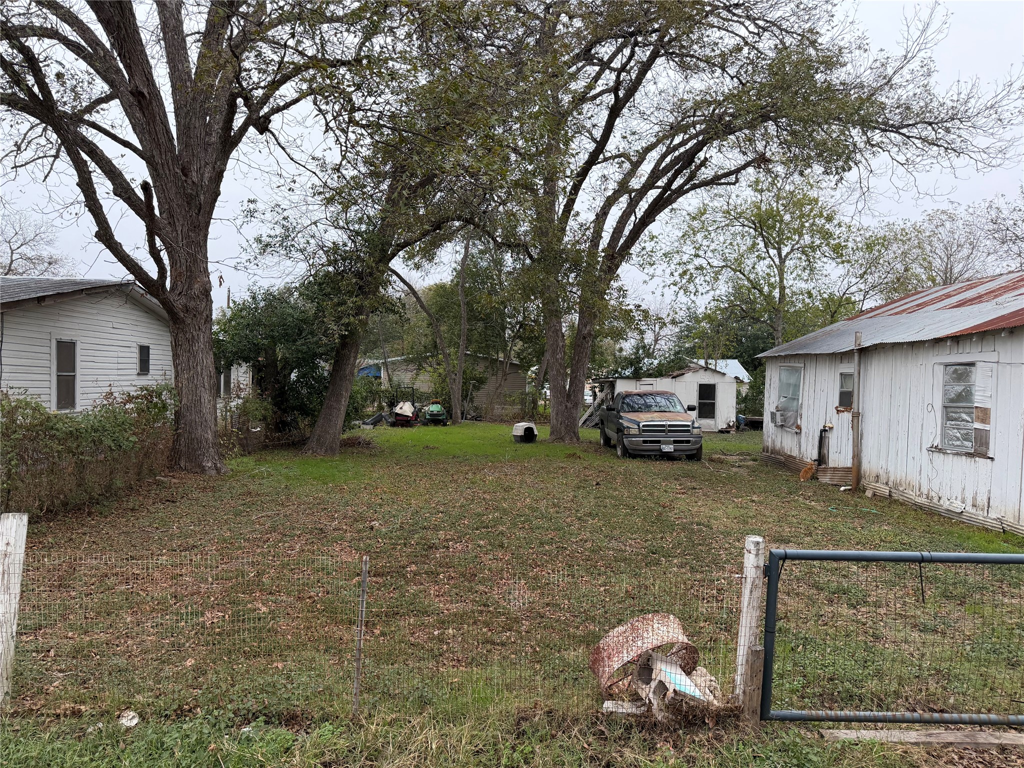 0 Persimmon Street Lockhart, TX 78644 - Photo 3 of 4 a house view with a garden space